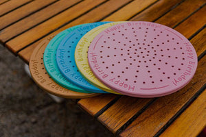 This image shows colorful Wishboards on a table.